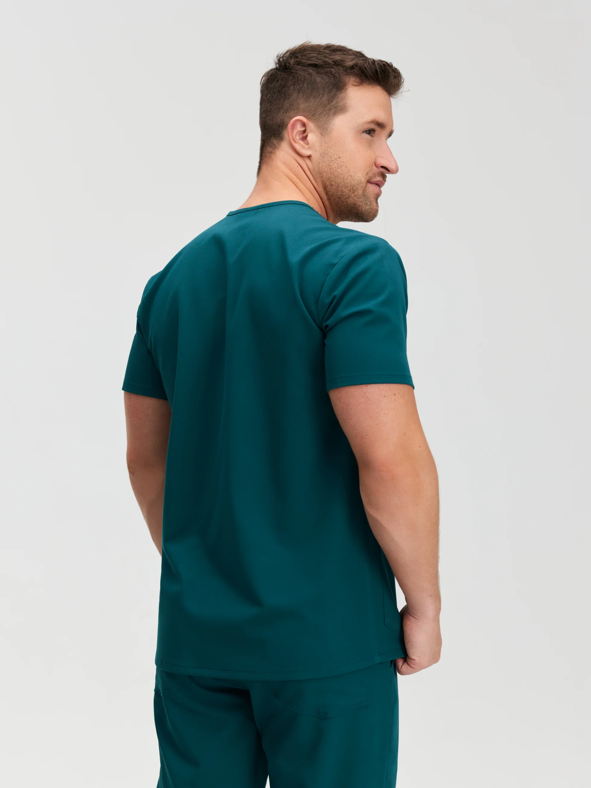 LOGAN With AOGQ EMBROIDERY - TEAL - One Pocket Men's Scrub Top - SILVADUR™ - Image 4