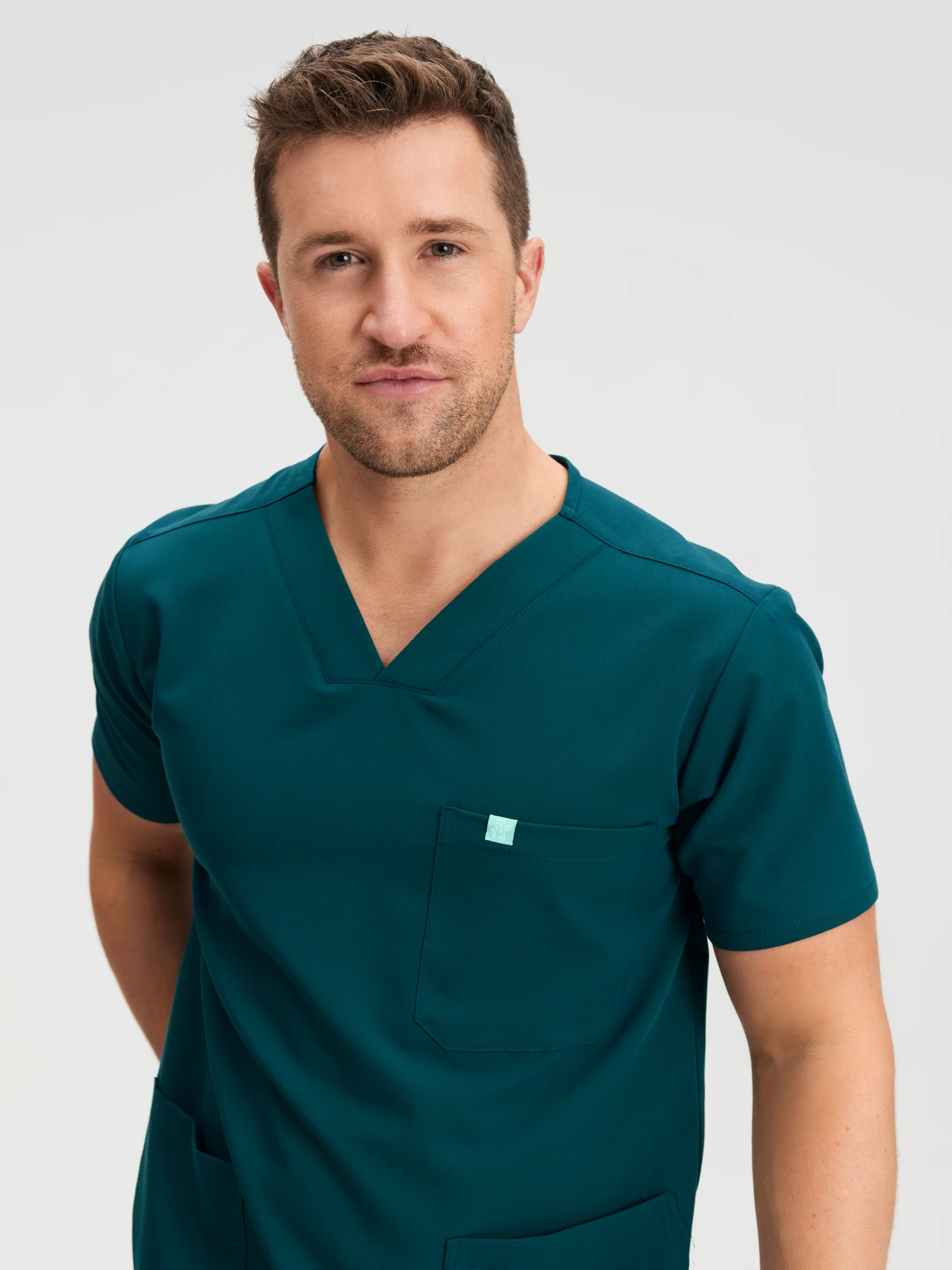 ZACK With AOGQ EMBROIDERY - TEAL - Three Pockets Men's Scrub Top - SILVADURâ„¢ - Image 3